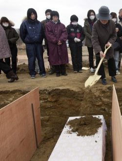 Dirt-shoveled-on-casket-website-pic.jpg